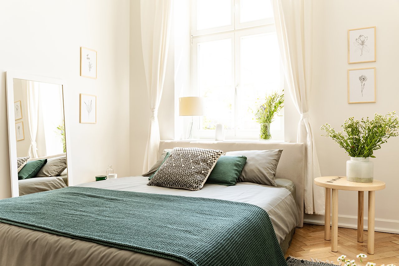 Eco-cotton-linen-and-blanket-on-a-bed-in-nature-loving-family-guesthouse-for-spring-and-summer-vacation